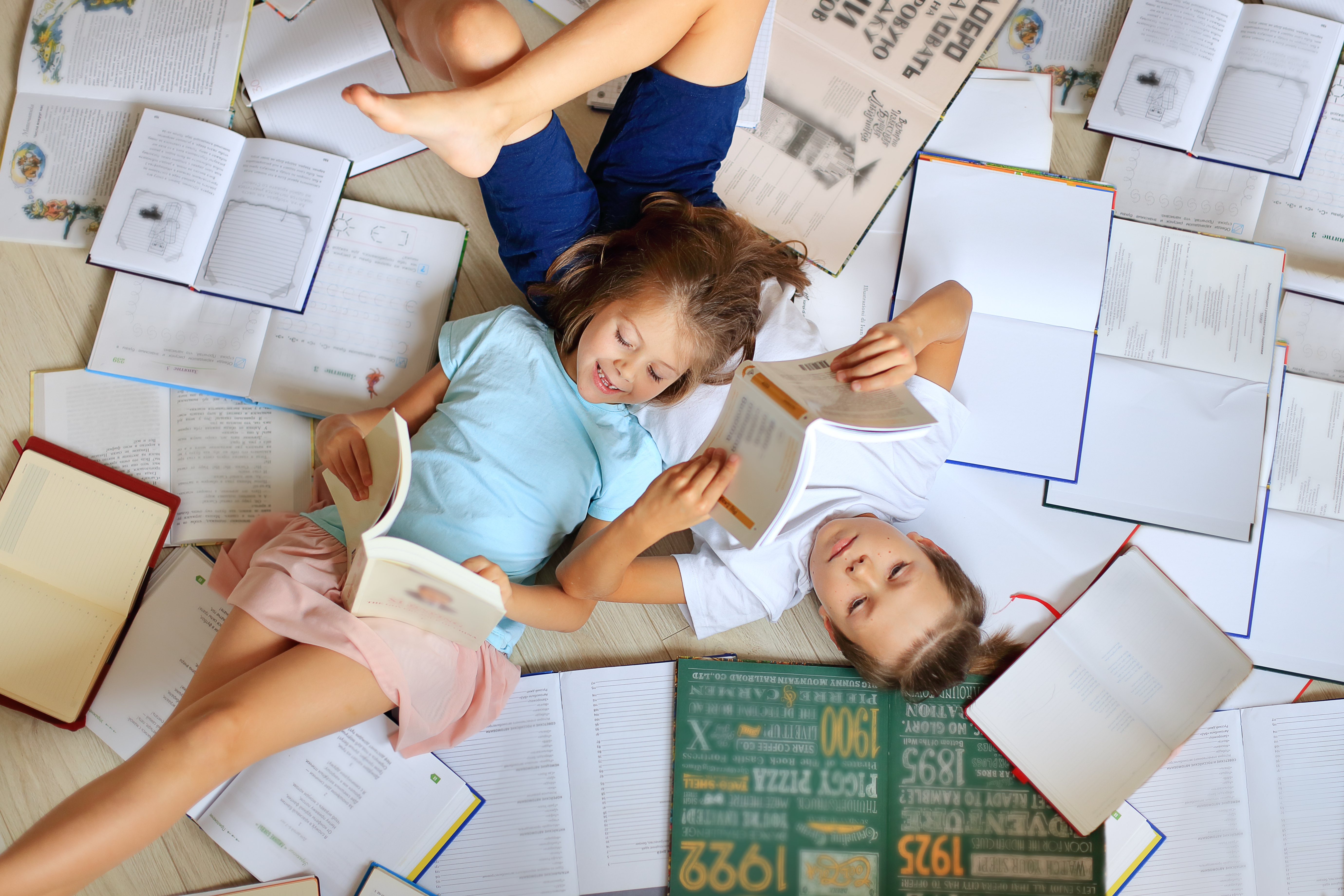 children reading KS2 level books
