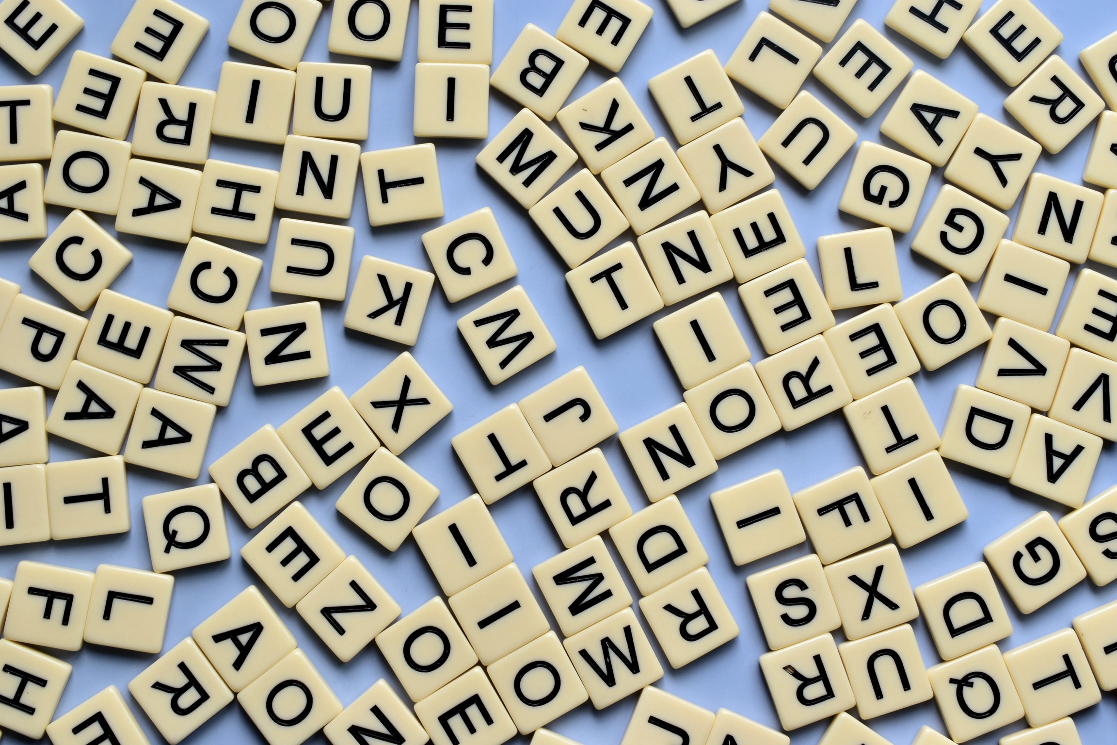 a picture of lots of different letter tiles
