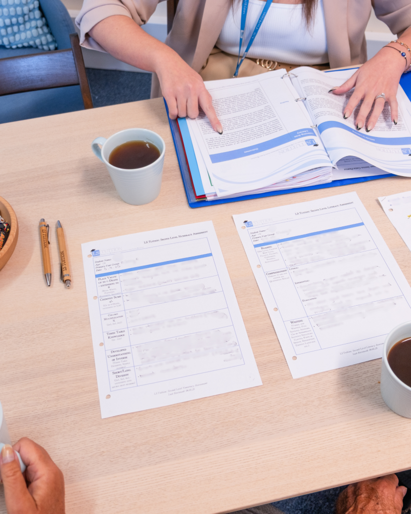 Reports being shared with parents at the LS Tuition Learning Space